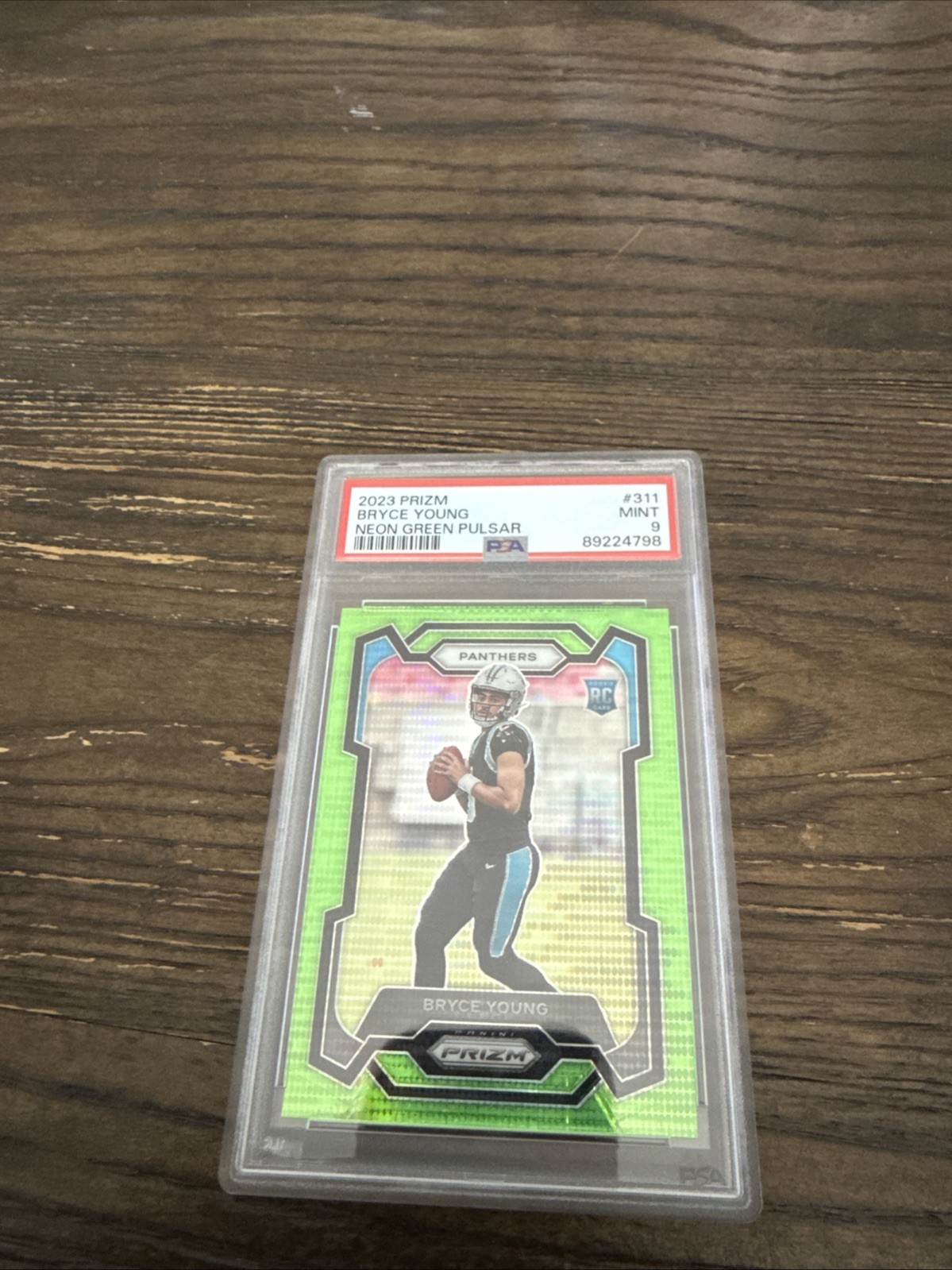 2023 Panini Prizm - Rookies Bryce Young #311 Neon Green Pulsar Prizm (RC)