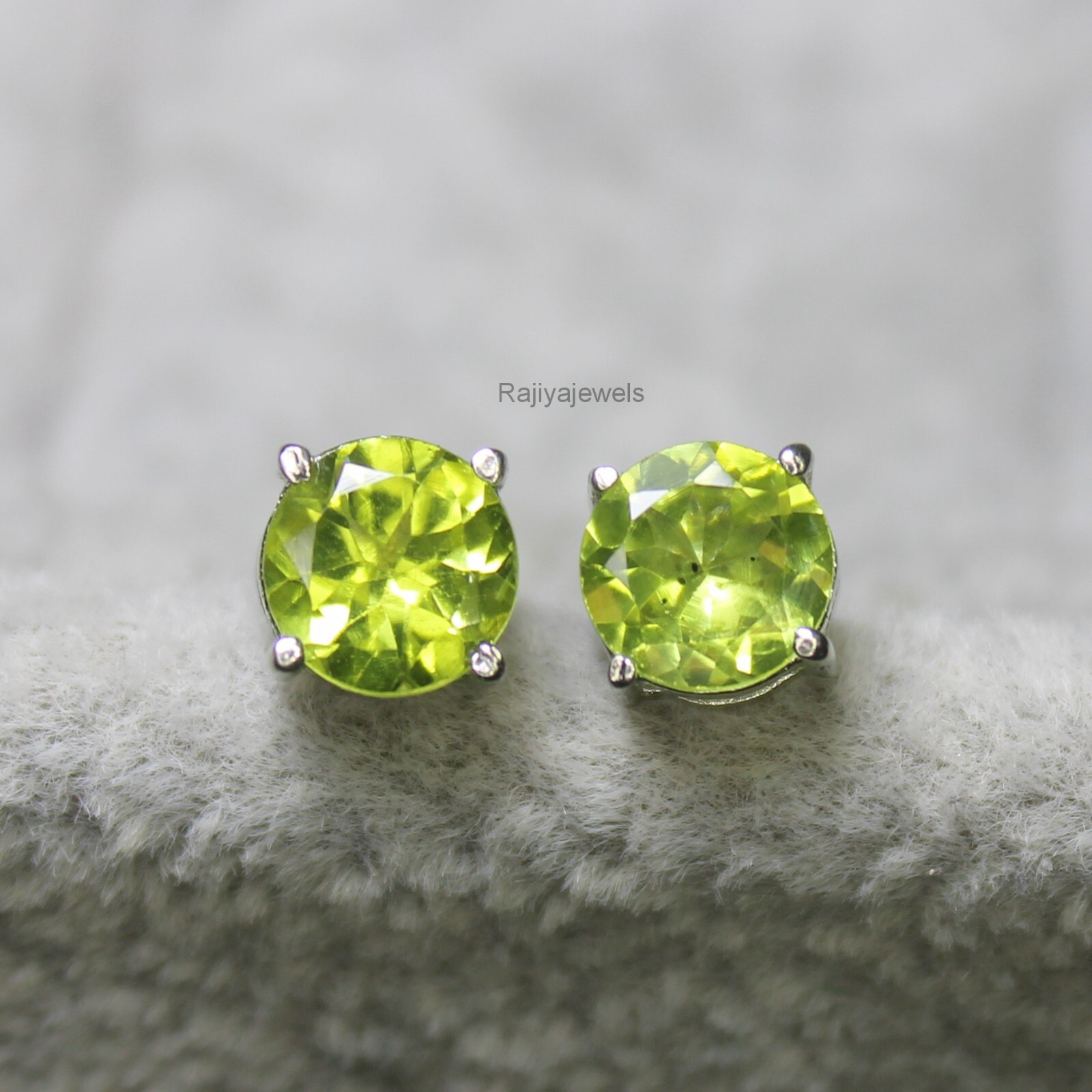 Peridot stud earrings with natural green gemstone set in 925 sterling silver for August birthdays-image