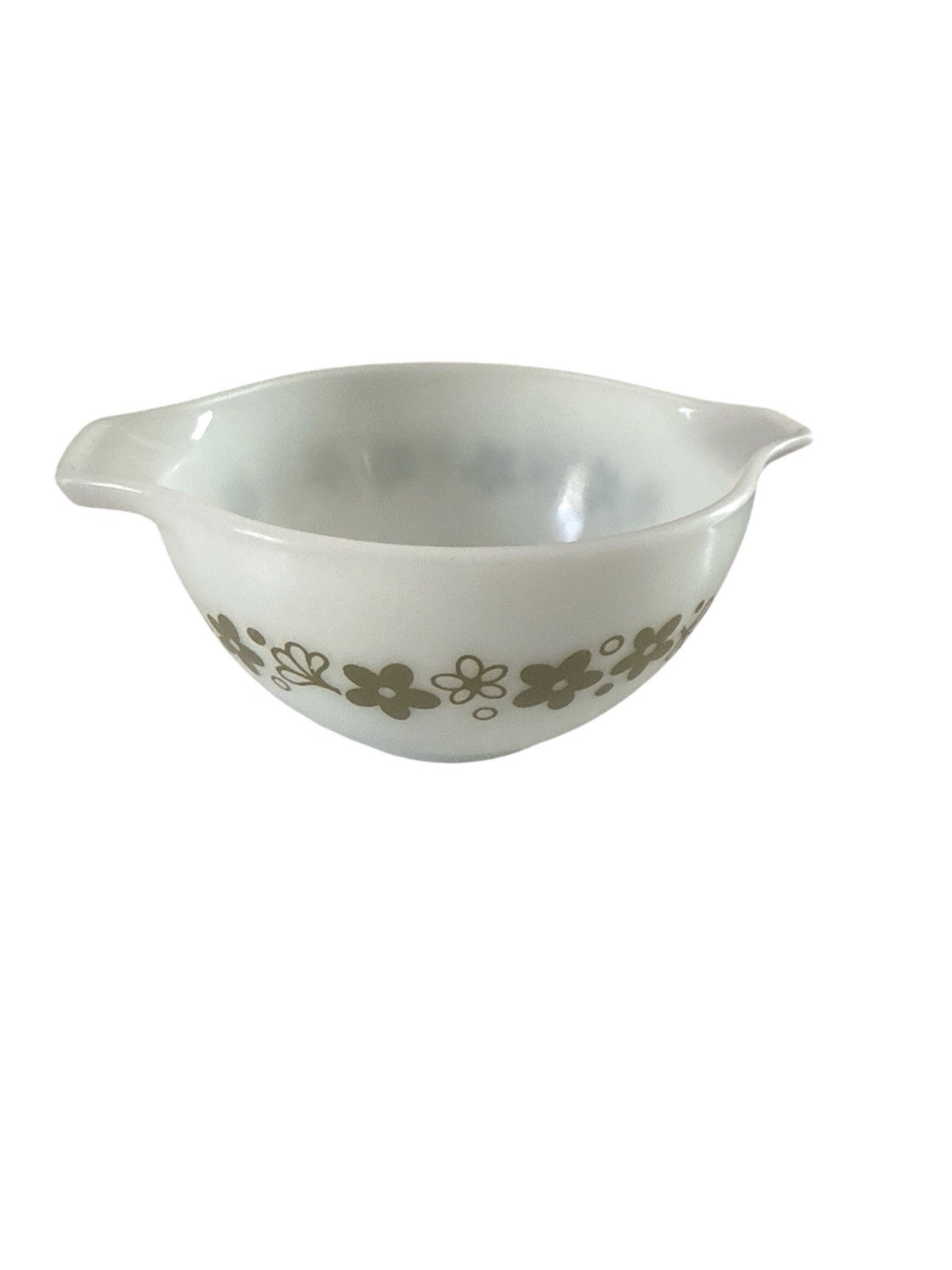 Green Pyrex Cinderella bowl with the Spring Blossom Crazy Daisy pattern