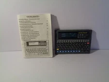 WORLDMATE MODEL 298-AIL Language Translator with Instruction Manual **READ** H3
