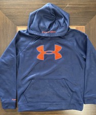 Under Armour Storm boys blue hooded sweatshirt size youth L with pockets.