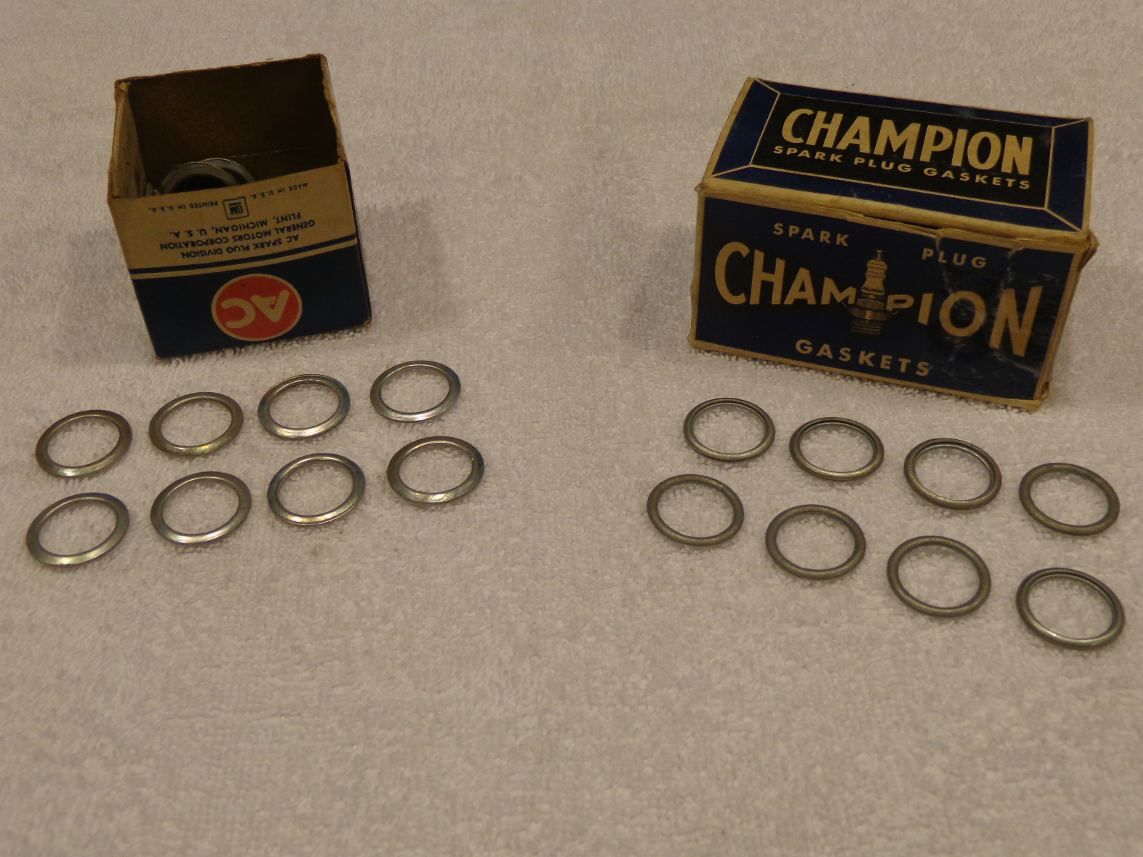 (8)......‘NOS’ Champion 18mm Spark Plug Gaskets......Steel.....Made in USA eBay