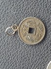 bronze tone metal coin pendant charm with square hole and bail loop — photo 4