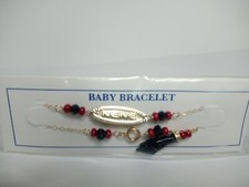 Pulsera de azabache en 14k para beb