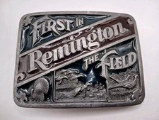 WA25120 NOS VINTAGE 1989  REMINGTON  FIREARMS FIRST IN THE FIELD GUN BUCKLE
