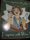 Metal/Tin, wine sign Schonberg "improves with age" made in USA looks vintage