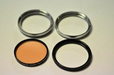 A 55mm threaded adapter to accept a series VII drop in filter w/85 filt.  52-55