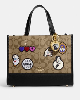 coach disney コラボ バッジ Coach New Disney X Coach Villains Locket Bag Charm Gold/Multi