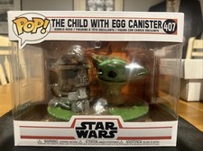 Funko Pop! Figura de vinilo Star Wars The Child (Baby Yoda) con bote de huevos #407