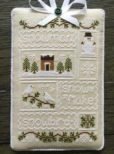 COMPLETED XSTITCH CHRISTMAS "SNOW SAMPLER" ORNAMENT/WALL HANG