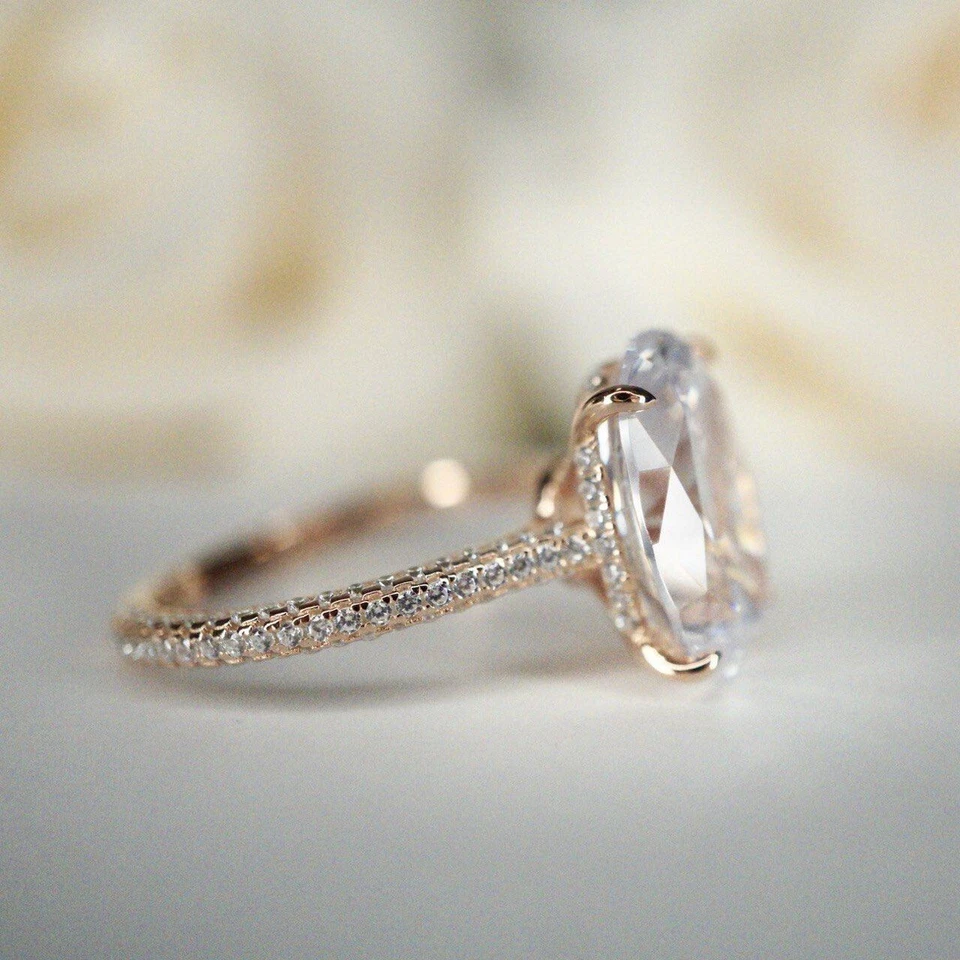 Anillo de compromiso de piedra moissanita de corte ovalado de 3,00 quilates de oro rosa macizo de 14 quilates Foto 2 de 4