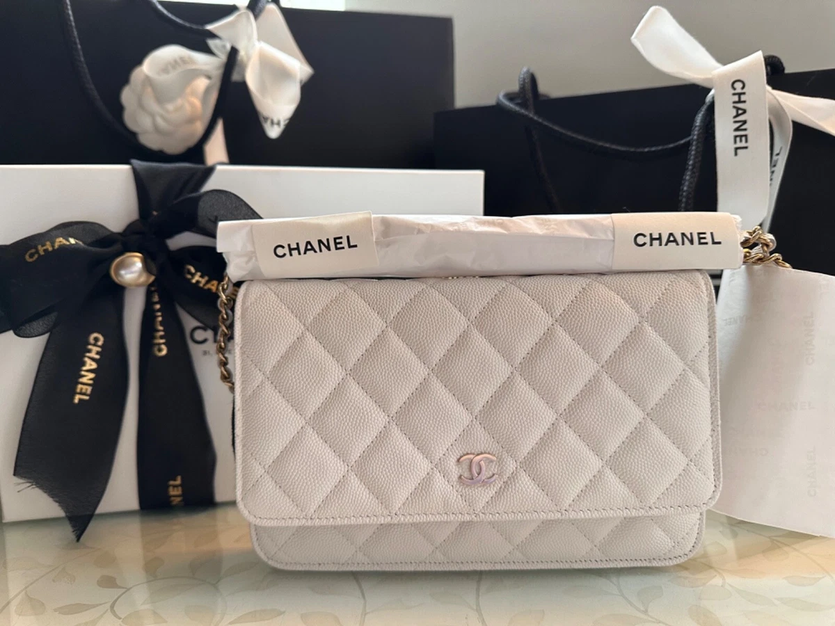 Authentic Chanel White Caviar Wallet On Chain (WOC) Handbag