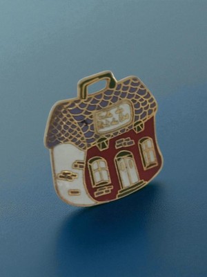 Pin's publicitaire vintage en émail - Accessoire rétro de