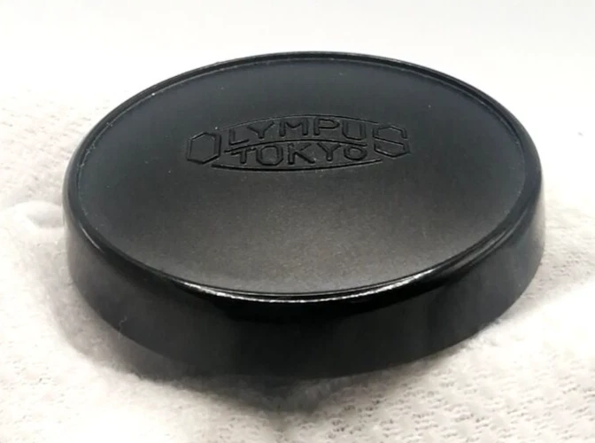 🎦VIDEO👀✨COMO NUEVO✨ Lente Olympus Tokyo Tapa frontal de metal 42 mm push-on de JAPÓN Foto 4 de 4