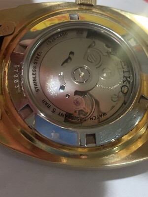 Seiko 7S26-04B0 Automatic Watch Maroon Dial Day Date Stainless