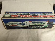 1997 HESS TOY TRUCK AND RACERS (2) RACE CARS BRAND NEW IN BOX