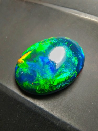 Cabujón de ópalo de fuego azul etíope grado AAA 10,85 CT vibrante pestañas ve... - Imagen 2 de 5