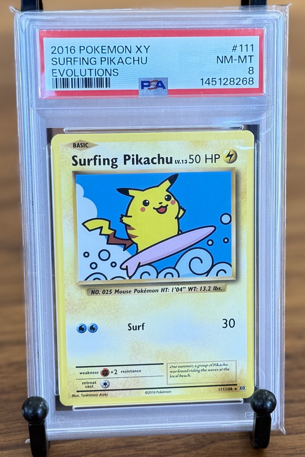 Pokemon TCG Surfing Pikachu Secret Rare Regular 111/108 Evolutions PSA 8 EN 2016 view 1