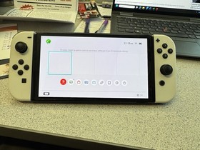 Nintendo - Switch OLED Handheld Console - 64GB Model: HEG-001 with White Joycons
