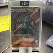 2021 Panini XR Luminous Endorsements Travis Etienne Jr. Auto Orange /25 #LUM-TET