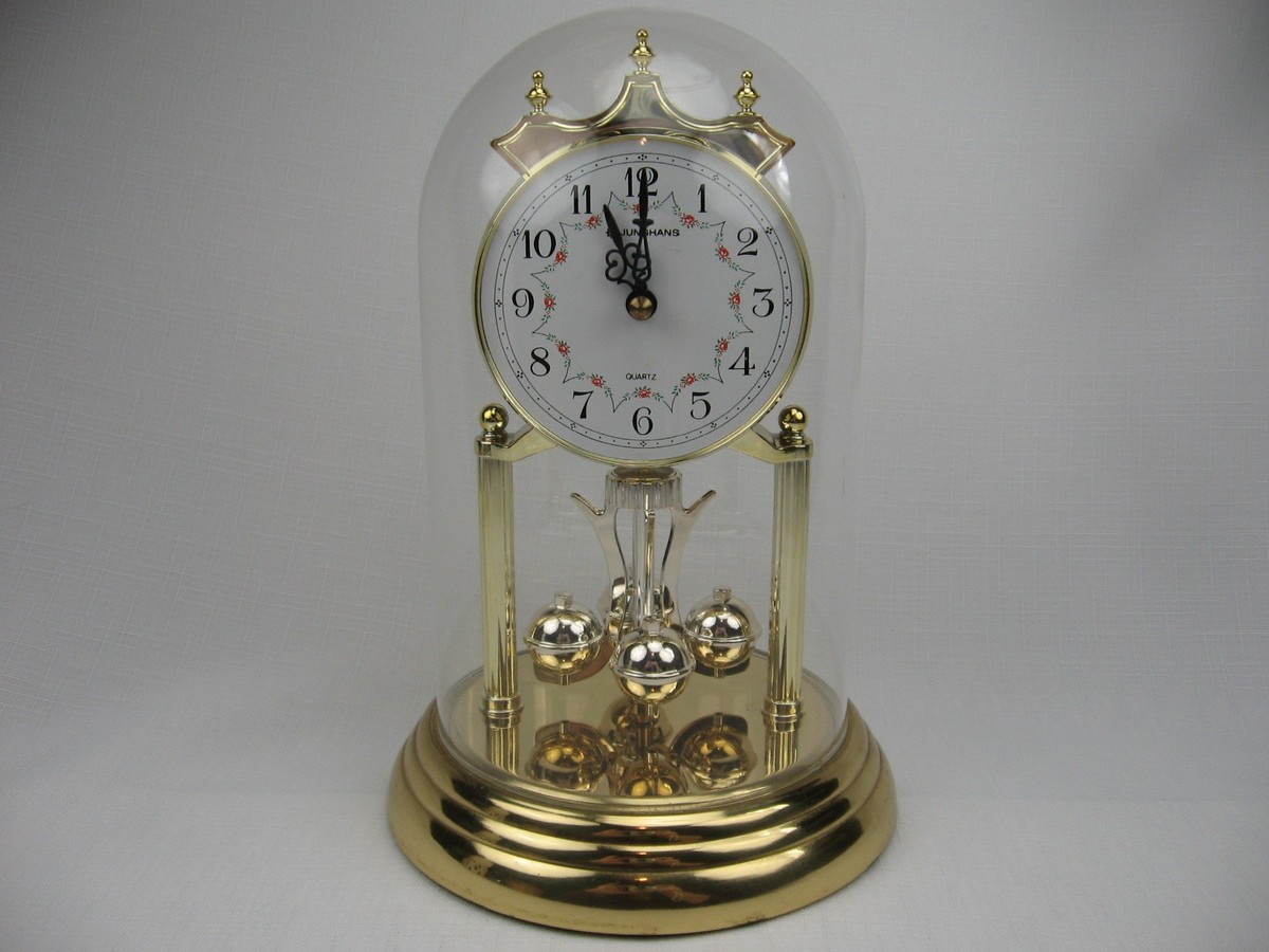 Vintage Junghans Germany anniversary quartz clock brass rotating
