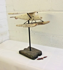 Aereo giocattolo anni 50 galleggiante in legno intagliato a mano con supporto