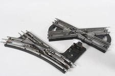 Q14G45- 2x Märklin Modelleisenbahn Weiche elektrisch links Kreuz Spur 0