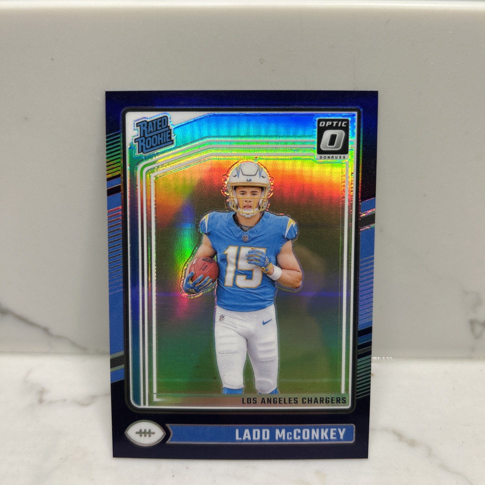 2024 Donruss Optic Ladd McConkey Rated Rookie #266 Purple Prizm /60 Chargers RC