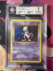 1999 Pokémon Base 1st Edition Thick Stamp Mewtwo Holo #10/102 — BGS 7 NM