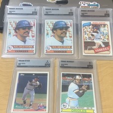 Topps Reggie Jackson 1979 #700, Nolan Ryan 1994 #34, Eddie Murray 1979 #640