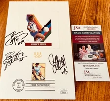 Julie Foudy Shannon MacMillan Tiffeny Milbrett signed 1996 US Soccer sheet (JSA)