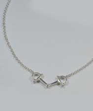 Silver necklace with central bite subject Luce 