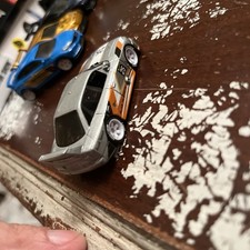 HOT WHEELS Audi 90 Quattro K Case Super Custom con piloti reali