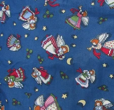 Christmas Angels Holly on blue Susan Winget Fabric Traditions 44" wide by the yd
