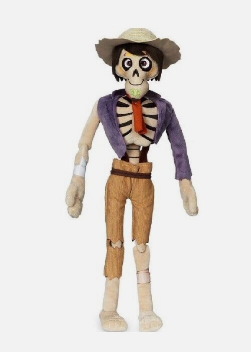 Peluche Coco Disney de collection en velours haut de gamme aux finitions brodées
