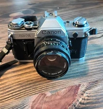 Canon AE-1 Program 35mm Manual SLR Film Camera with 50mm 1:1.8 Lens
