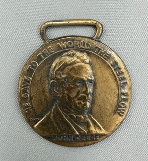 1937 JOHN DEERE WATCH FOB Centennial Plow Farm Equipment Advertising Vintage