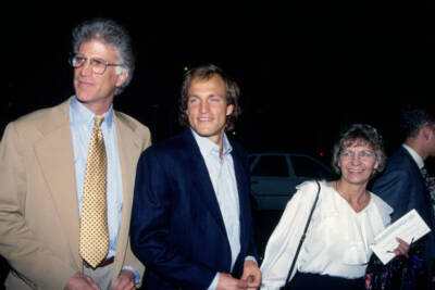 Ted Danson wearing a beige jacket over a light blue shirt with a y- Old Photo