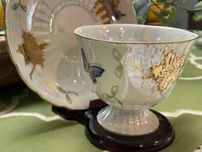 Beautiful Iridescent Footed Cup & Saucer w. Gold Trim & Leafs UNBRANDED