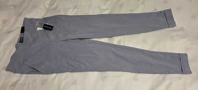 SoHo Apparel Ltd petite blue ankle pants are designed with a slim fit and front