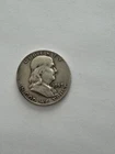 1957- Franklin Half Dollar.