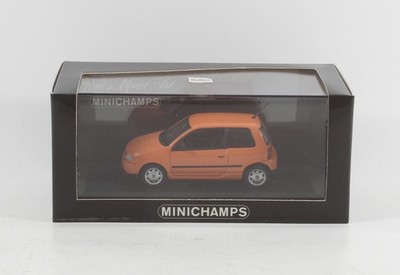 Seat Arosa Minichamps orange 1997 == Herpa Diecast PKW Modellauto 1:43