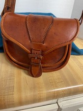 Leather crossbody. Small, possibly vintage, warm brown color.