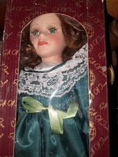 Gift Of Time Porcelain Doll
