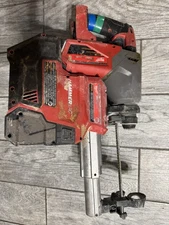 Milwaukee SDS Hammer Drill with Vacuum Dustless Attachment and Shop Vacuum