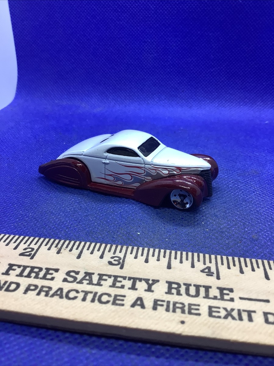 Mattel Hot Wheels 2002 Maroon, Silver and White with flame details