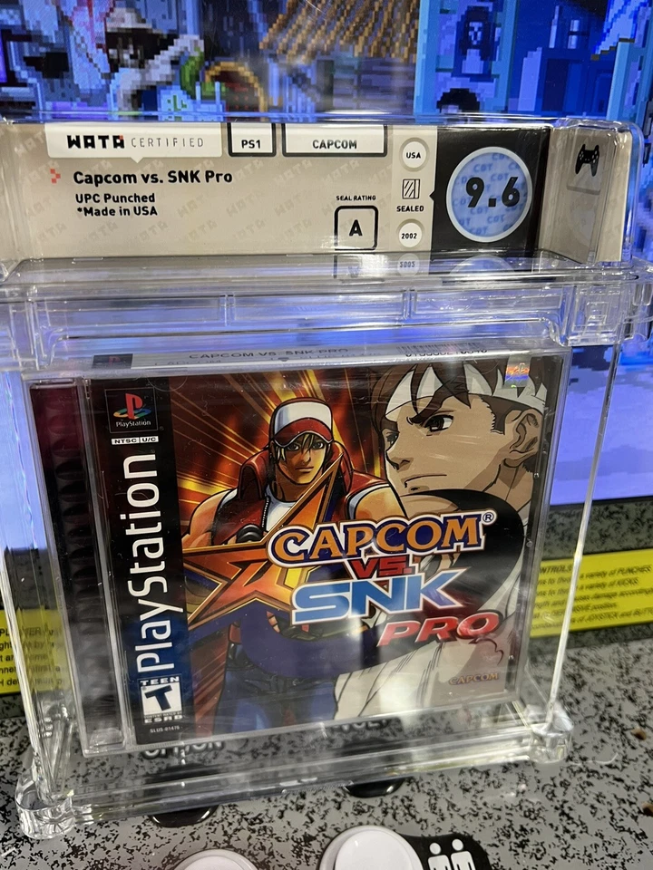 2002 PS1 Capcom vs SNK Pro Graded WATA 9.6 A Factory Sealed w/ UPC Punched Promo - Image 2 of 4