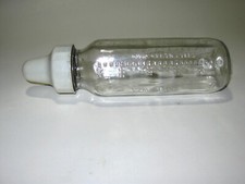 Vintage Glass Evenflo Baby Bottle; 8 Ounces with rim and Protective Cap