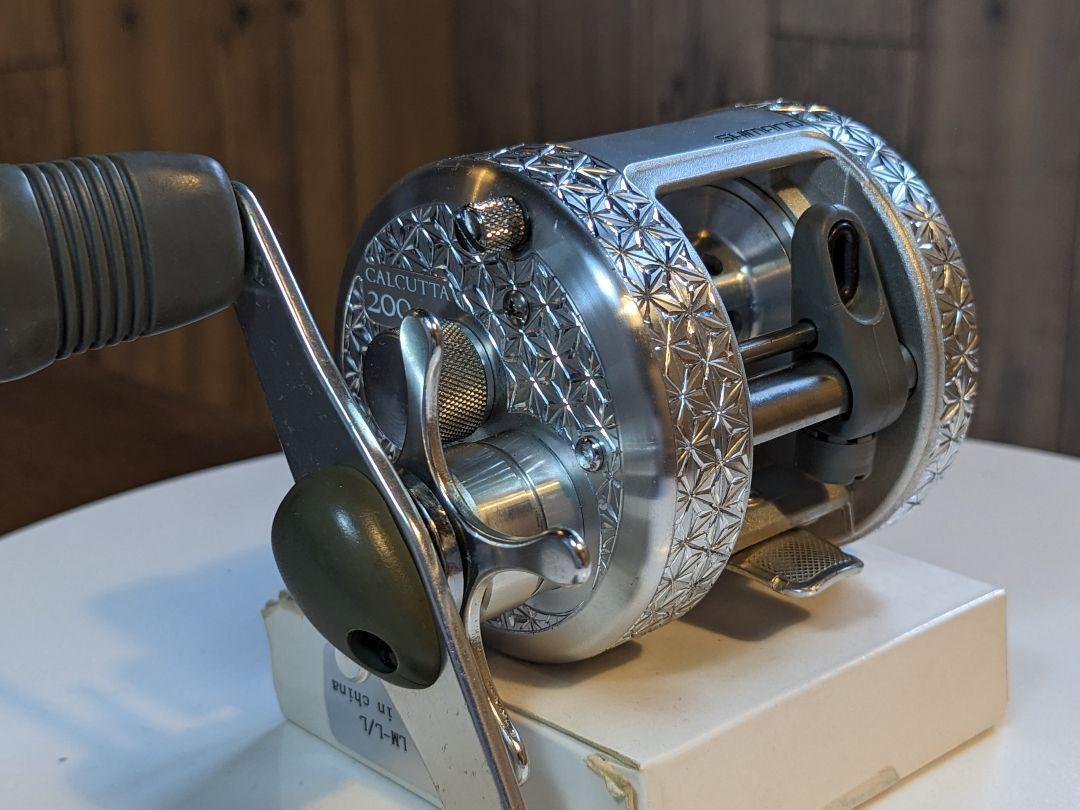 Shimano Calcutta 200 彫金 Engraving custom Shimano Calcutta 200 Engraving Custom Bait Reel Fishing