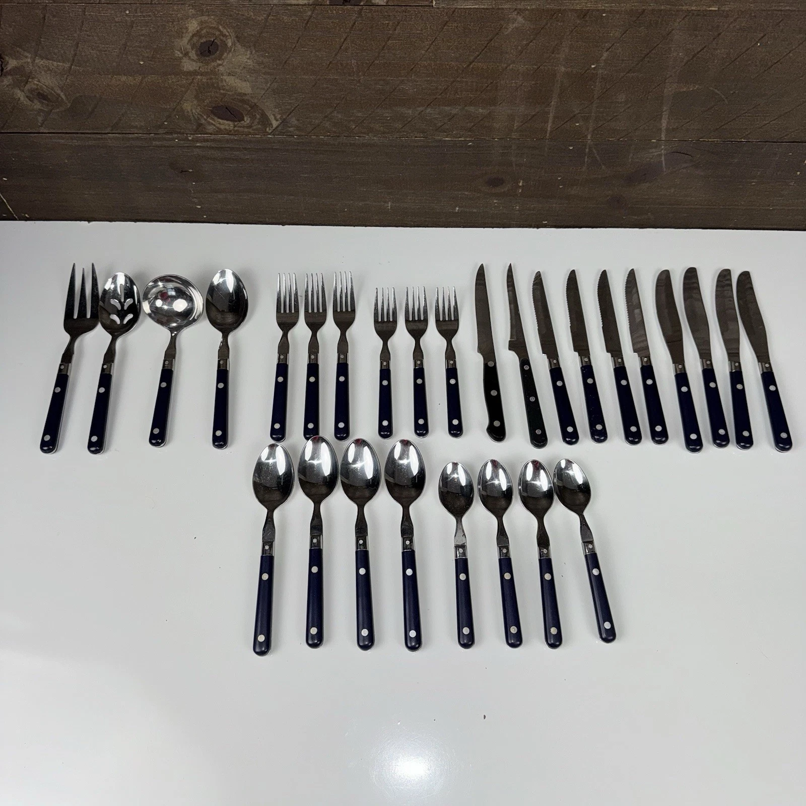 WF Mardi Gras Stainless Flatware Navy Blue Plastic Handle Made In Korea 28 Pcs.